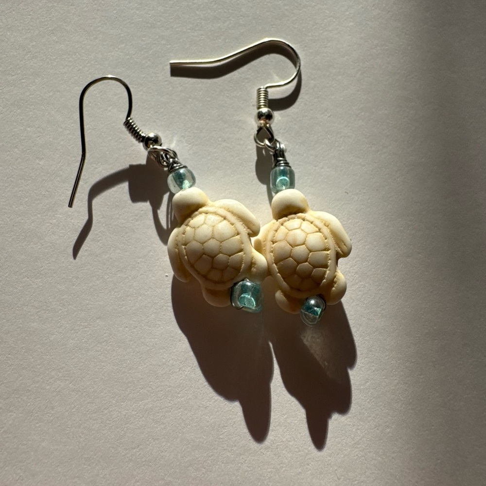 Handcrafted Silver Turtle Earrings with Blue Accents
